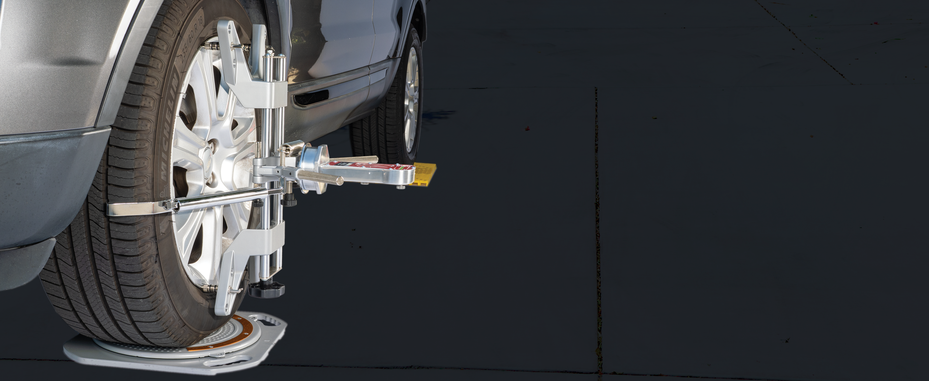 ASCCKG paired with ASWG001 wheel clamp, ASWG004 turn plates, and ASRP004 ramps in a home garage alignment bay