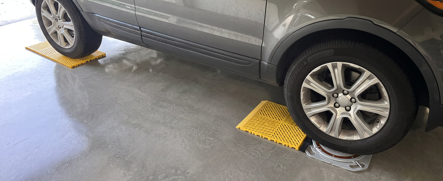 Car staged on ASRP004 ramps with a turn plate under the front wheel