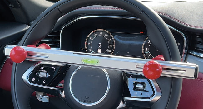 ASSTL1 level centered on a steering wheel