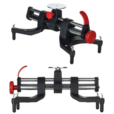 AutoSolo ONYX PRO wheel alignment clamp in matte black, angled view above the front view, showing the adapter plate, red tension knob, and handle