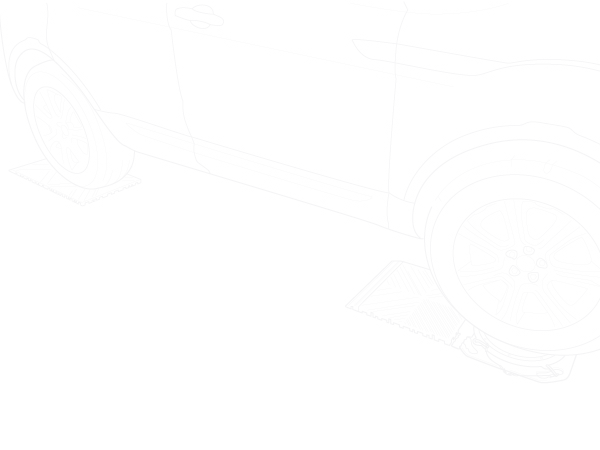 Line drawing of a car rolled up onto ramps with a turn plate under the front wheel