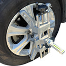 Picture of wheel clamp on a car wheel with a camber gauge attached